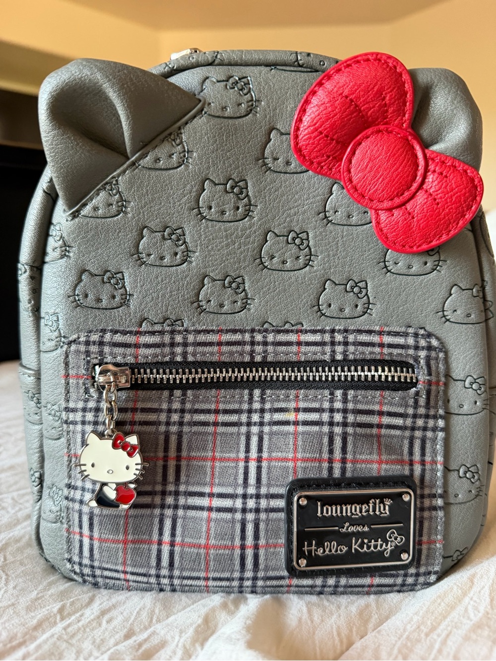 Loungefly Hello Kitty Grey Mini Backpack with Red Bow Accent